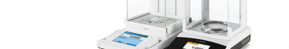 Analytical balance with draft shield